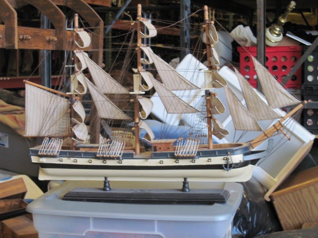 One of our favorite pieces is this model wooden ship that can be seen in the background of the photo above.