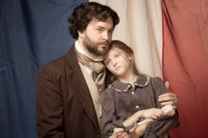 Kyle Olsen as Jean Valjean and Elise K. Anderson as Young Cosette.