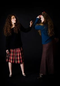 Natalia Noble as Carrie and Rachel Lynn Shull as Margaret in Utah Repertory Theatre Company's Carrie: The Musical. Photo by Jenny K Photography.