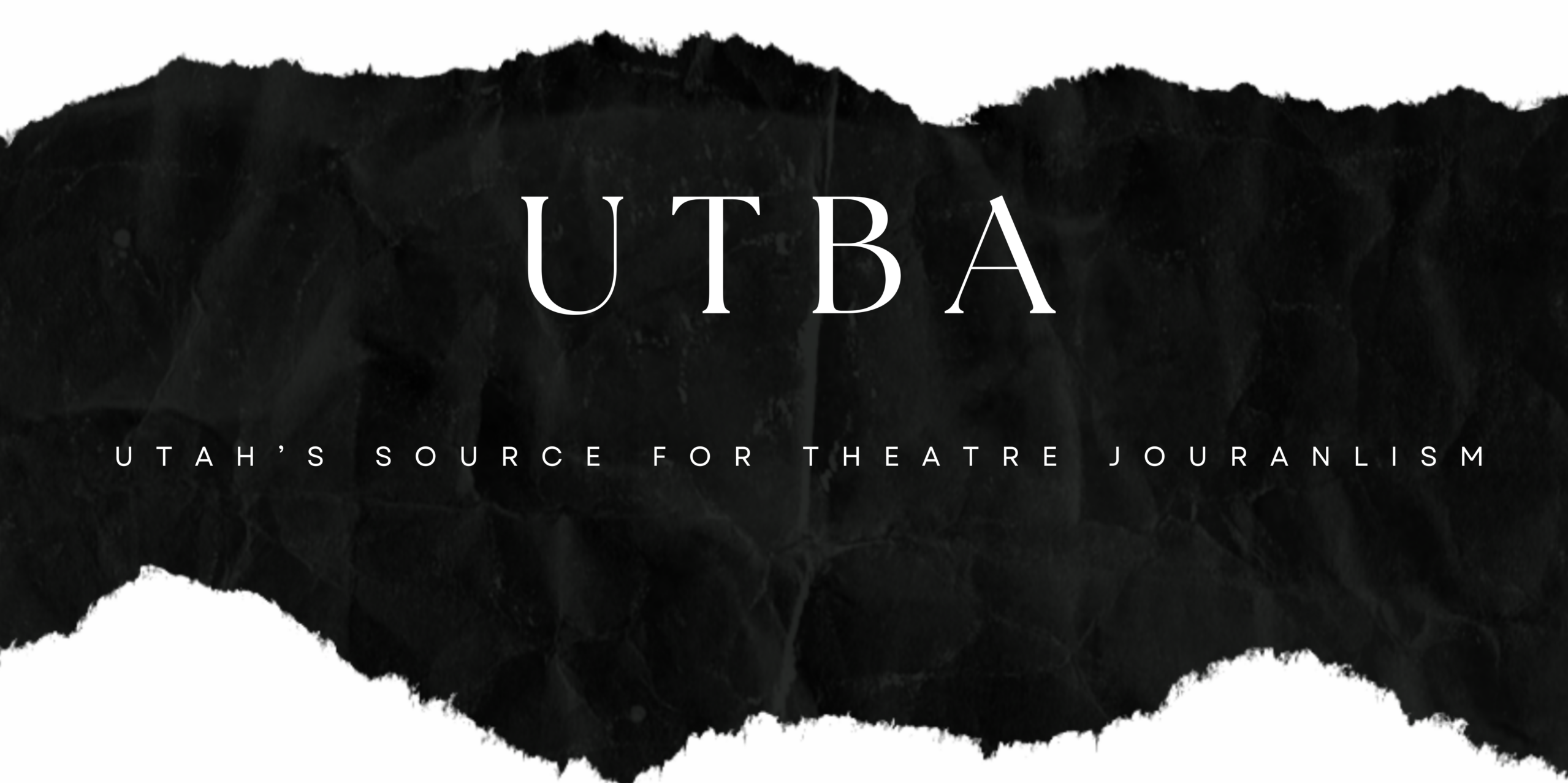 On a splashy black background, white print shows "UTBA" for Utah Theatre Bloggers Association. Below is a tagline which reads: Utah's Source for Theatre Journalism